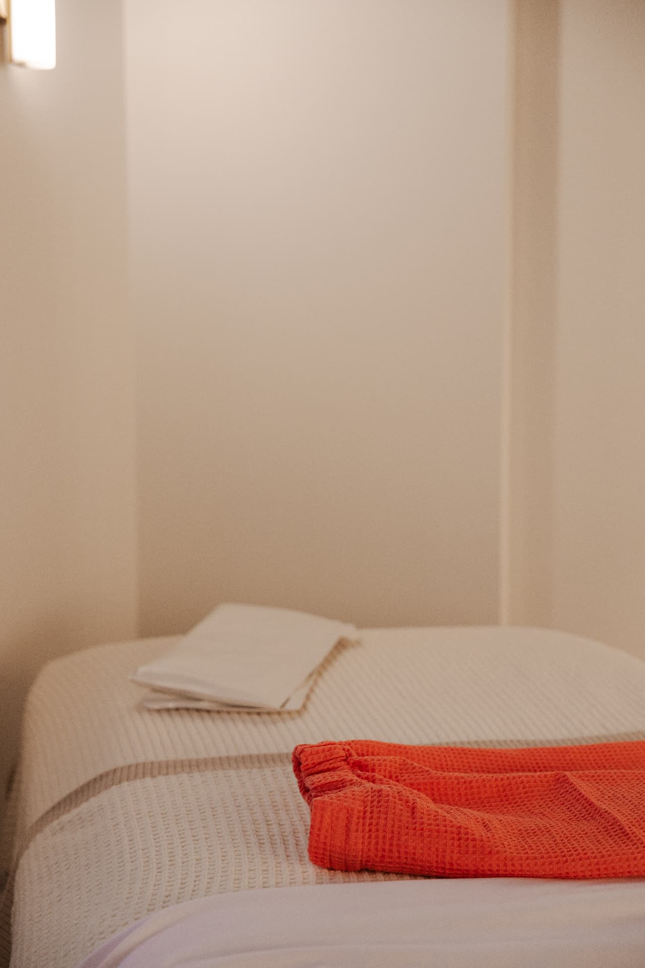 A prepared treatment bed at New Beauty Medical Aesthetics